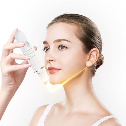 White handheld ultrasonic facial cleaner with scraper head near woman’s cheek