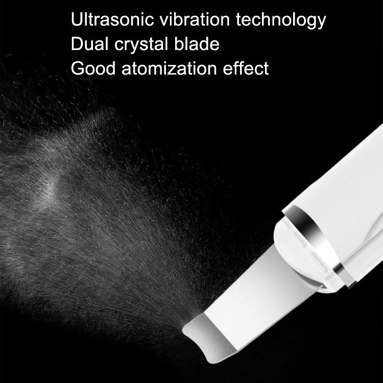 White ultrasonic facial scraper tip releasing mist-like particles