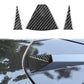 Carbon-fiber look triangular sticker applied to rear camera corner trim