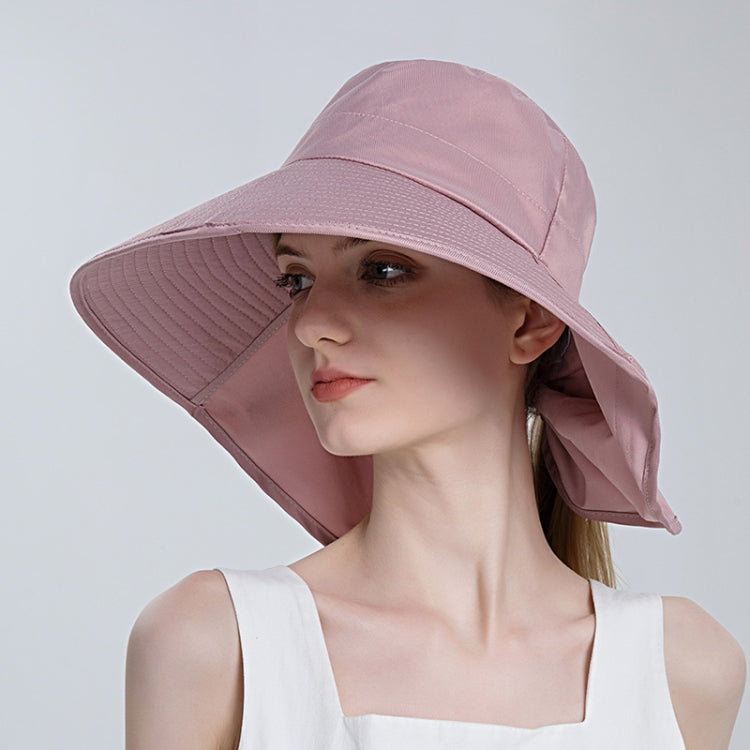 Pink large-brim ponytail bucket hat with wide flared brim and back ponytail flap.