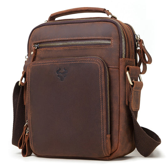 Brown leather shoulder messenger bag with front zip pocket and side buckle strap details
