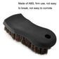 Black handled detailing brush with brown bristles and a grip hole