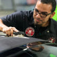 Black horsehair detailing brush used to clean and polish a car interior surface
