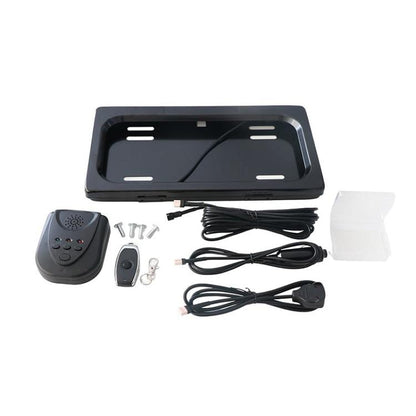 Black license plate bracket with remote control, wiring harness, and mounting hardware