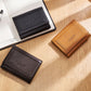 Leather men wallets in black and brown, showing front card pocket panels