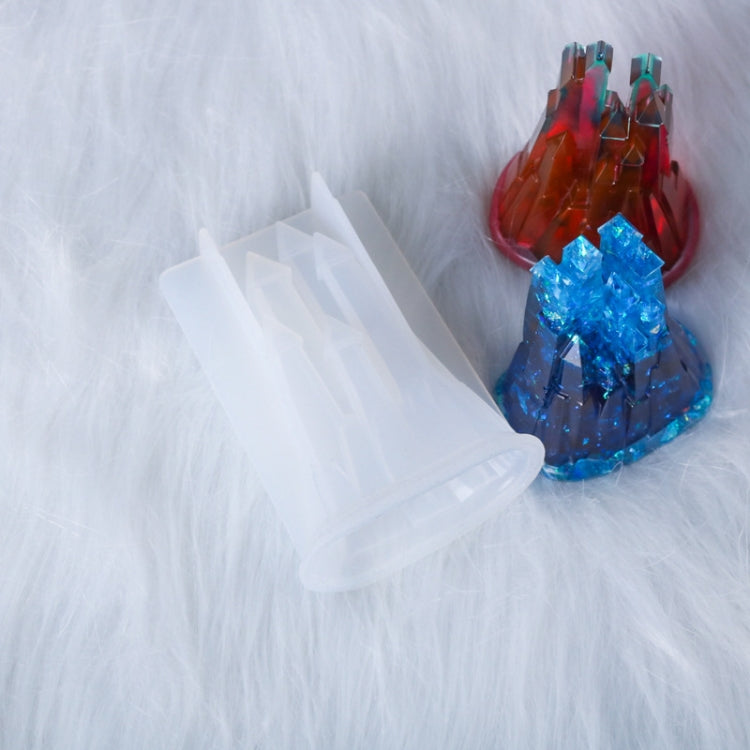 White silicone castle mold with angled tower compartments and stepped base