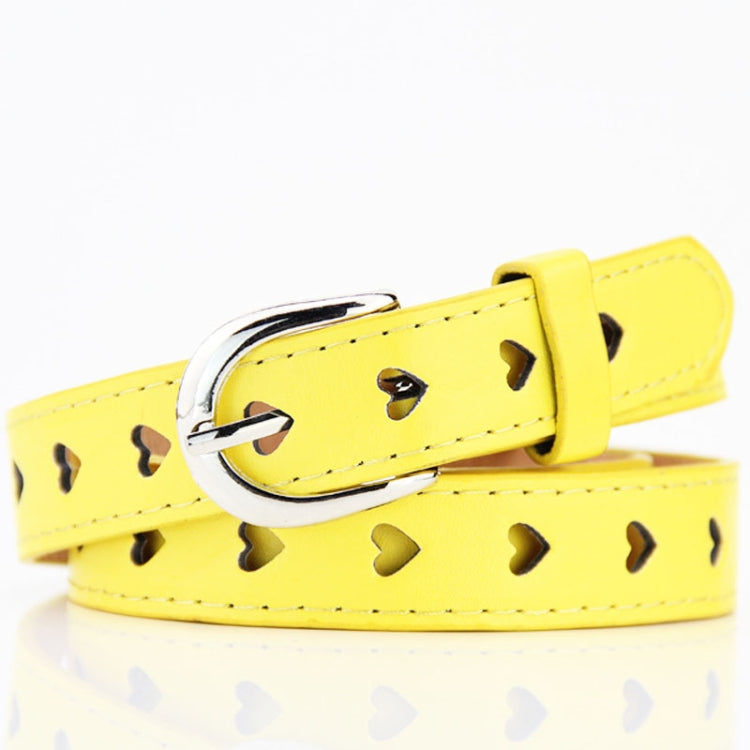 Yellow women’s belt with heart cutouts and silver buckle