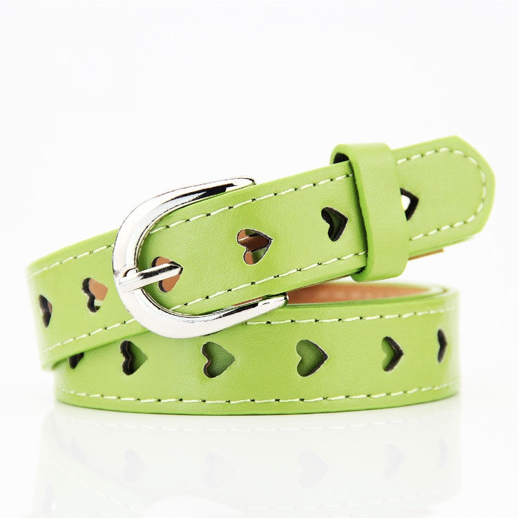 Green women’s belt with heart cutouts and silver buckle