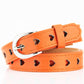 Orange women’s belt with heart cutouts and silver buckle