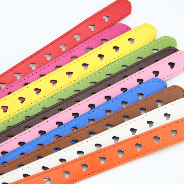 Colorful heart motif belt straps with silver eyelets and buckles, angled view