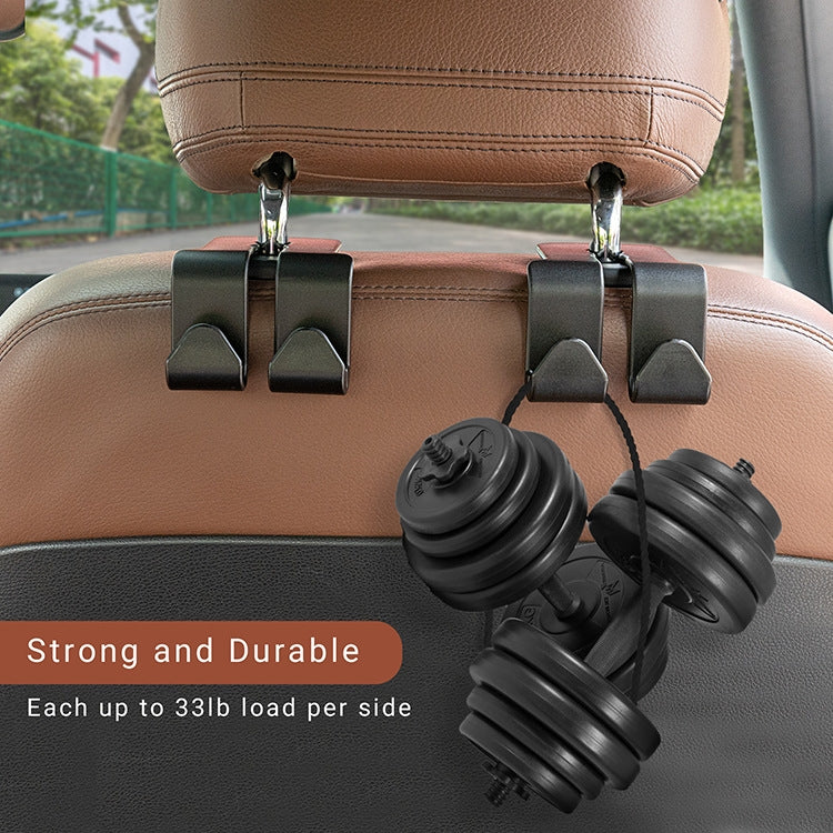 Car seat phone holder with black cradle arms and chrome hook pins on brown seat