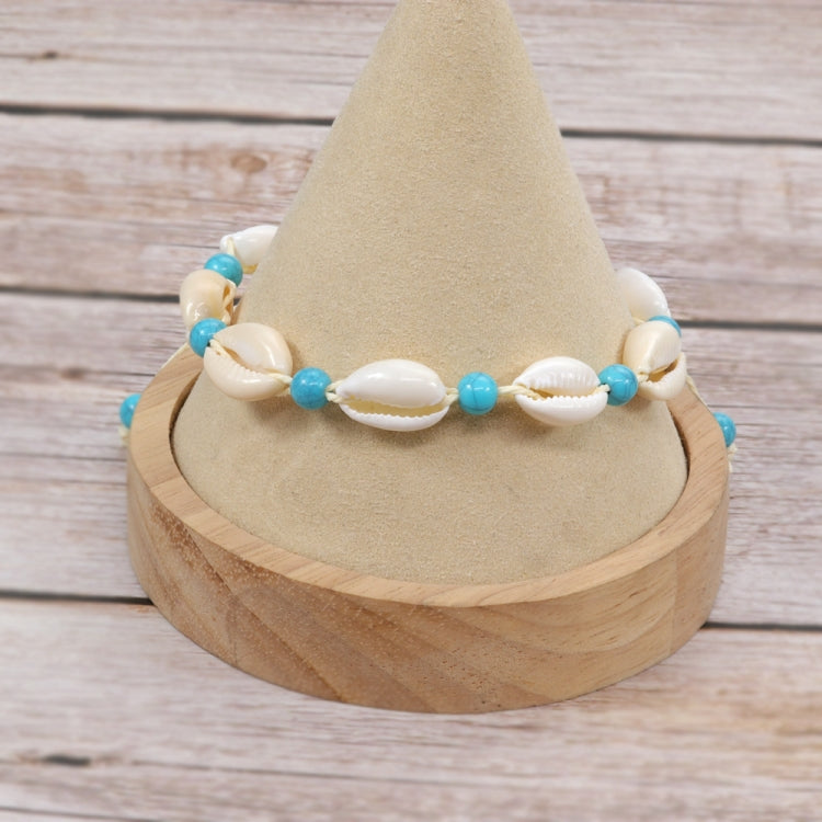 Shell and bead bracelet on adjustable rope with white cowries and turquoise blue beads