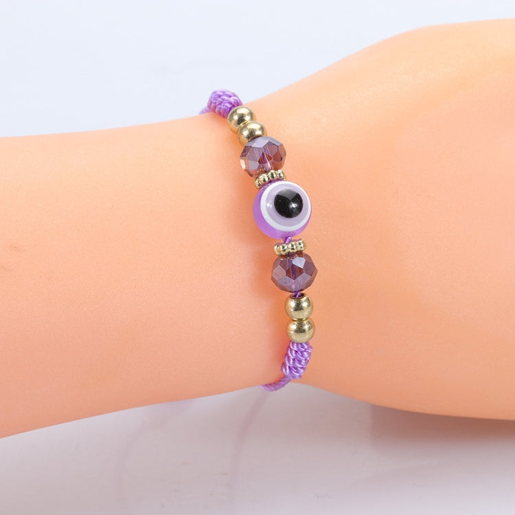 Purple adjustable evil-eye bracelet with faceted crystal beads and gold-tone spacers