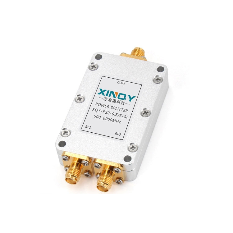 RF microstrip power splitter with four SMA ports, white housing, COM marking on panel