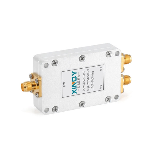 RF microstrip power splitter with SMA connectors, white housing, label on metal case