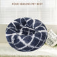 Round dark blue shag pet bed with white abstract swirl pattern