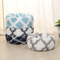 Set of two round long-haired pet beds: light blue/white and white/gray patterned