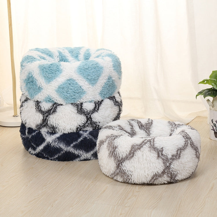 Set of two round long-haired pet beds: light blue/white and white/gray patterned