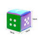 Single cube die with green and purple sides and white paw-print graphics