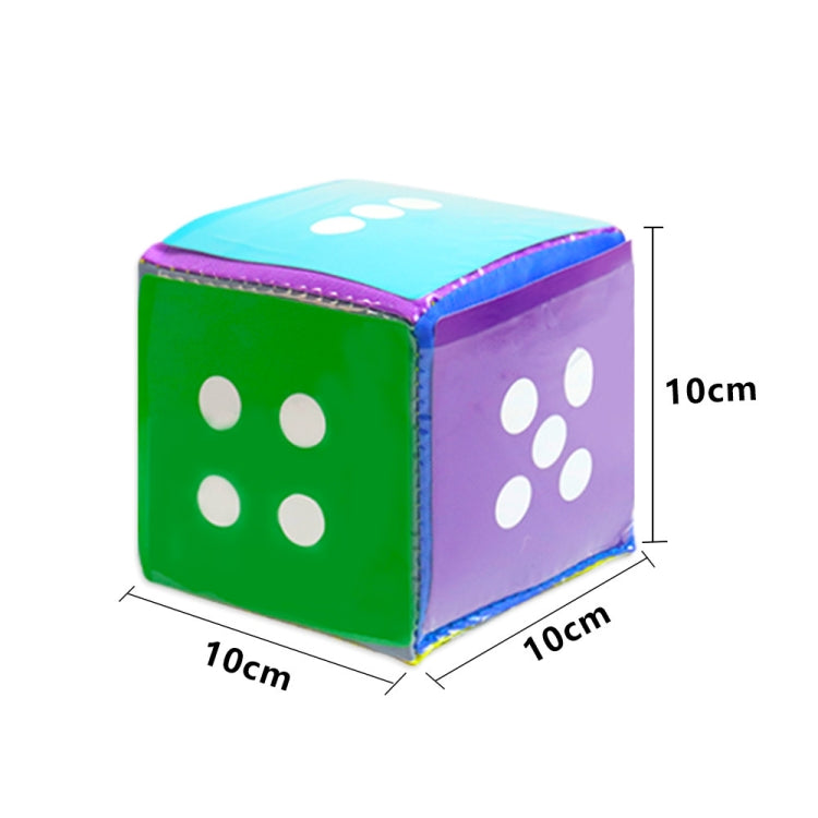 Single cube die with green and purple sides and white paw-print graphics