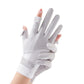 White cycling gloves with flip-finger tips, padded thumb, and stitched cuffs