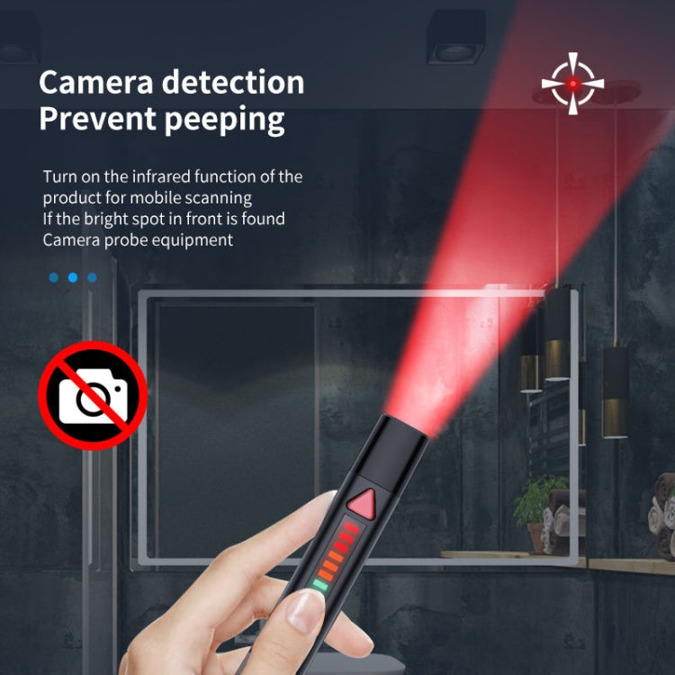 Hand holding black signal detection pen with red triangle and glowing LED bars.
