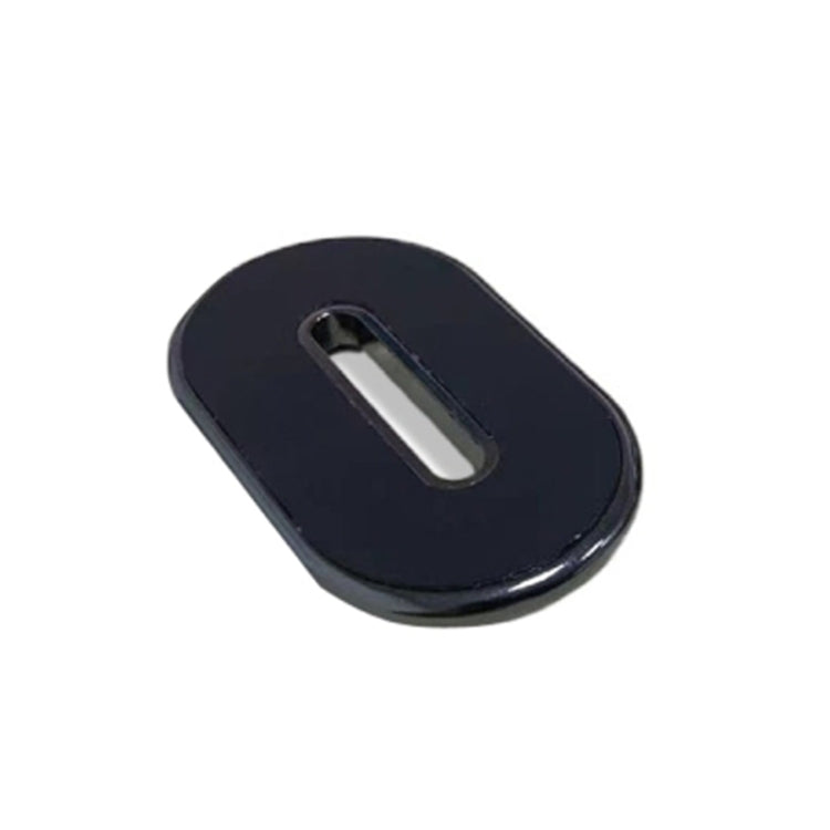 Black oval magnetic car dashboard mini phone holder with silver metal center insert