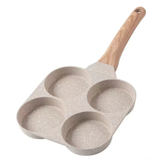 Four-cup egg frying pan with speckled nonstick stone finish and light wood handle