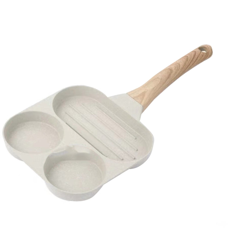 Nonstick four-well egg pan with wooden handle and shallow round compartments