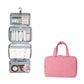 Pink foldable waterproof toiletry bag with transparent compartments and hanging hook