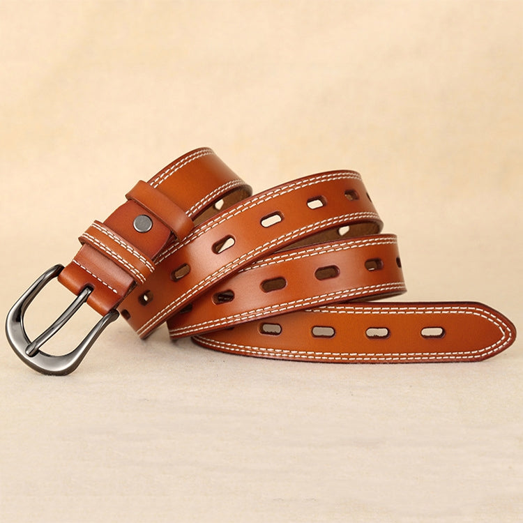 Double-stitched hollow pin buckle belt, orange-brown leather with silver buckle and white stitching