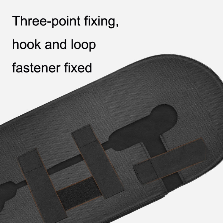 Black chain cover strap area with hook-and-loop fastener detail.