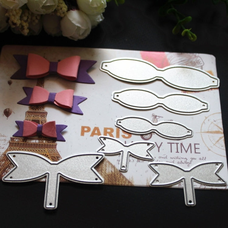 Bow knot metal cutting dies and finished layered ribbon bows with metal outlines