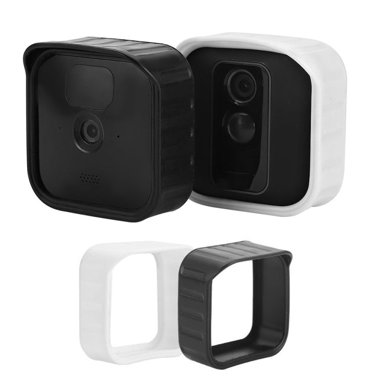 Black and white silicone camera protection covers, side-by-side with openings