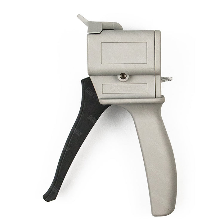 Manual glue pusher gun with grey casing, trigger grip, and wide applicator