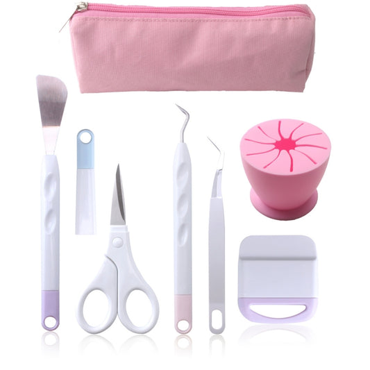 Vinyl weeding tool set with pink storage pouch, pink tool head, and white handled tools