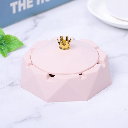 Pink stainless steel ashtray with cover, gold crown knob on the lid