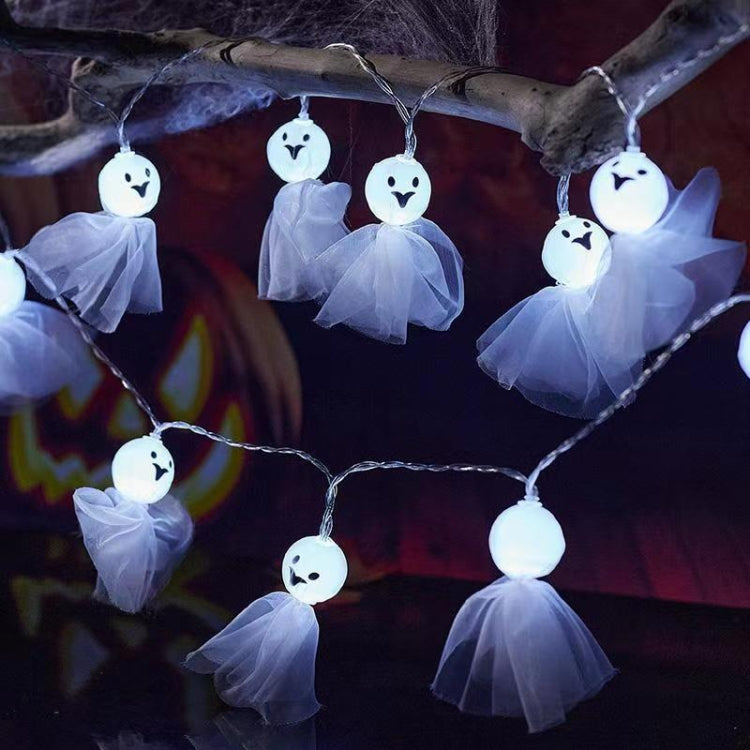 LED ghost string lights showing white tulle ghost charms with glowing faces on wire