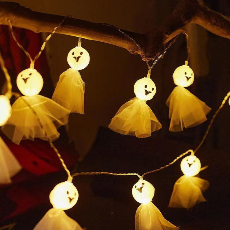 LED ghost string lights, warm white lit ghost faces with soft yellow tulle skirts
