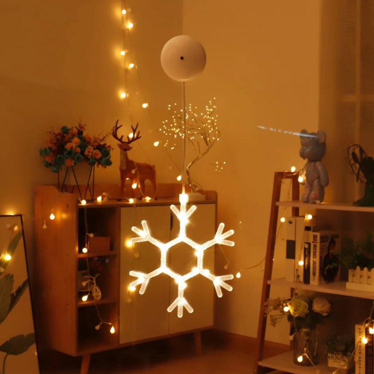 LED hanging snowflake decoration with warm white light