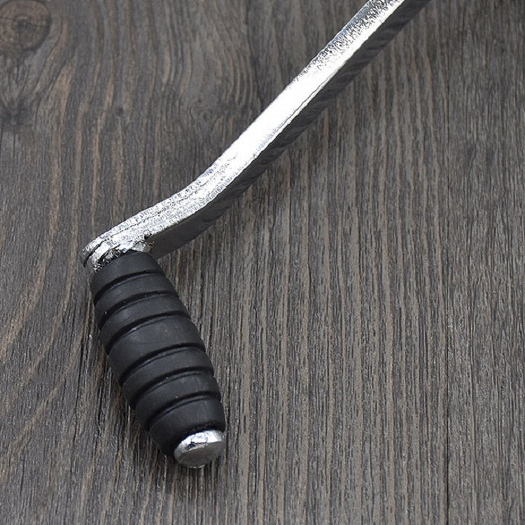 Rubber-grip foot peg end on chrome step shift lever