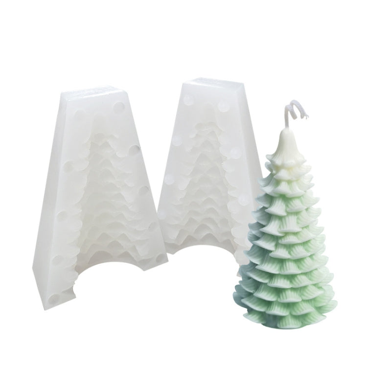 Two-piece white Christmas tree silicone candle mold with sample white-and-green layered candle