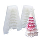 Two-piece white Christmas tree silicone candle mold with sample pink-white tree candle