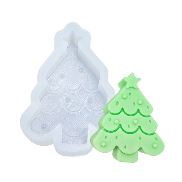 Christmas tree silicone candle mold, white, with molded tree shape and green sample candle