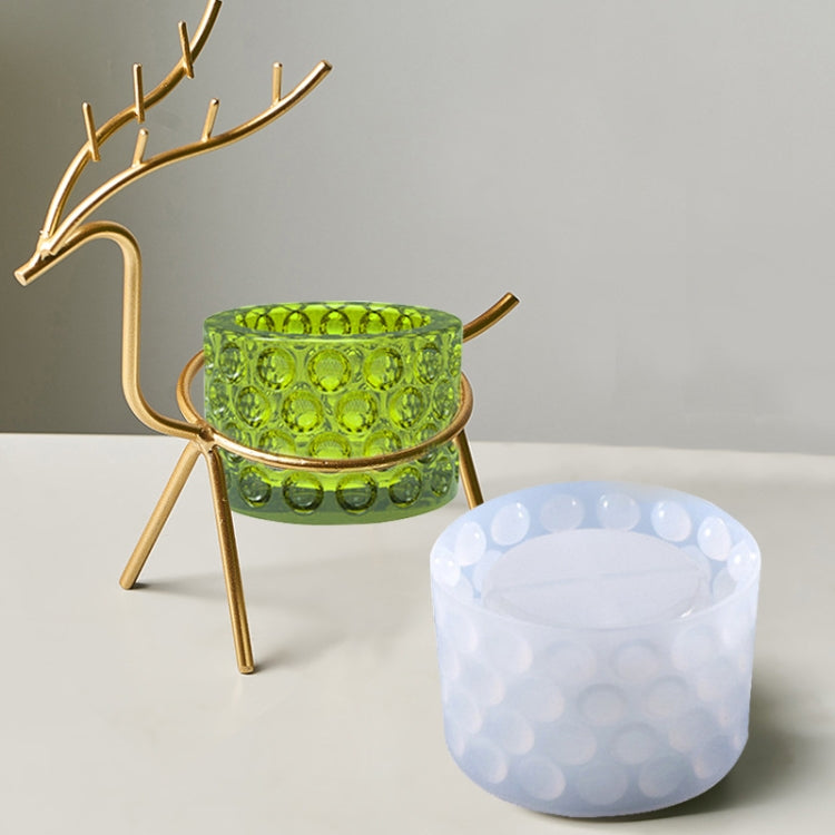 Polka-dot silicone mold: translucent green textured cup and clear light blue round cup