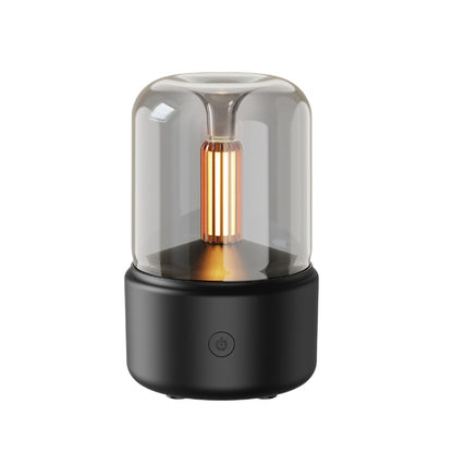 Black aroma diffuser with simulated candlelight glass dome and USB base