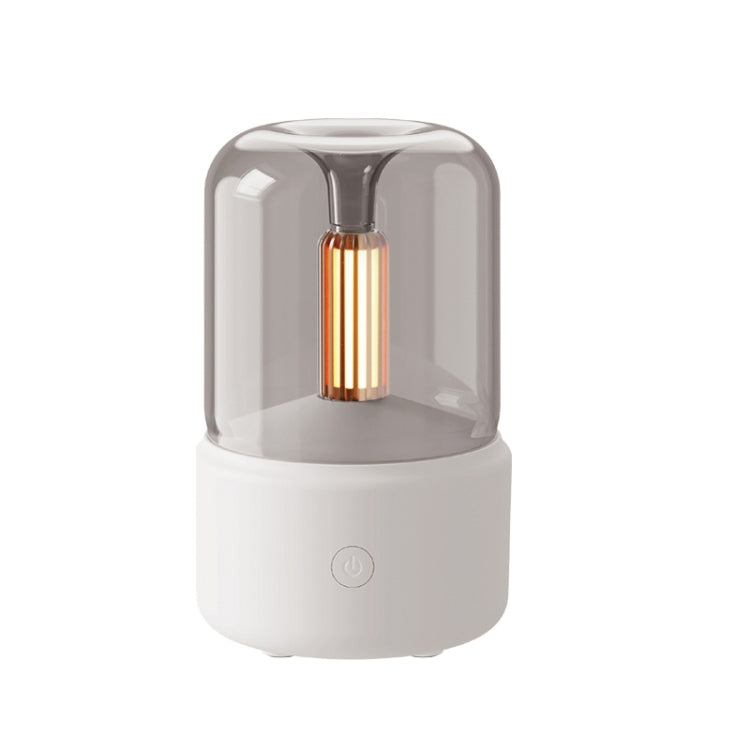 Beige aroma diffuser with simulated candlelight glass dome and USB base