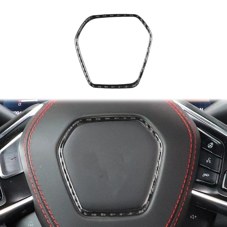 Black steering wheel trim sticker with silver outline, applied to steering wheel
