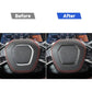 Steering wheel frame sticker installed: black trim with silver border and red stitching