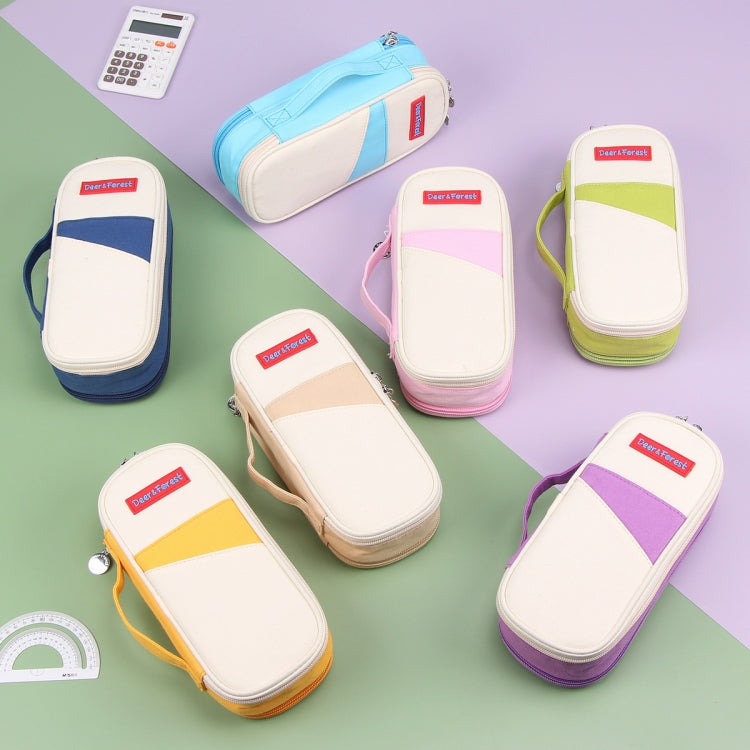 Set of colorful canvas pencil cases with zip closures in navy, green, pink, purple, and more.